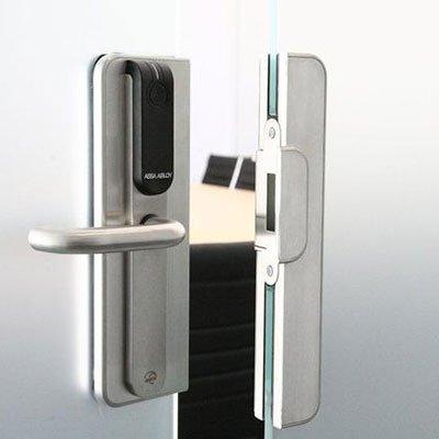 ASSA ABLOY - Aperio® Architectural glass solution with Aperio® escutcheons For Glass Door Applications
